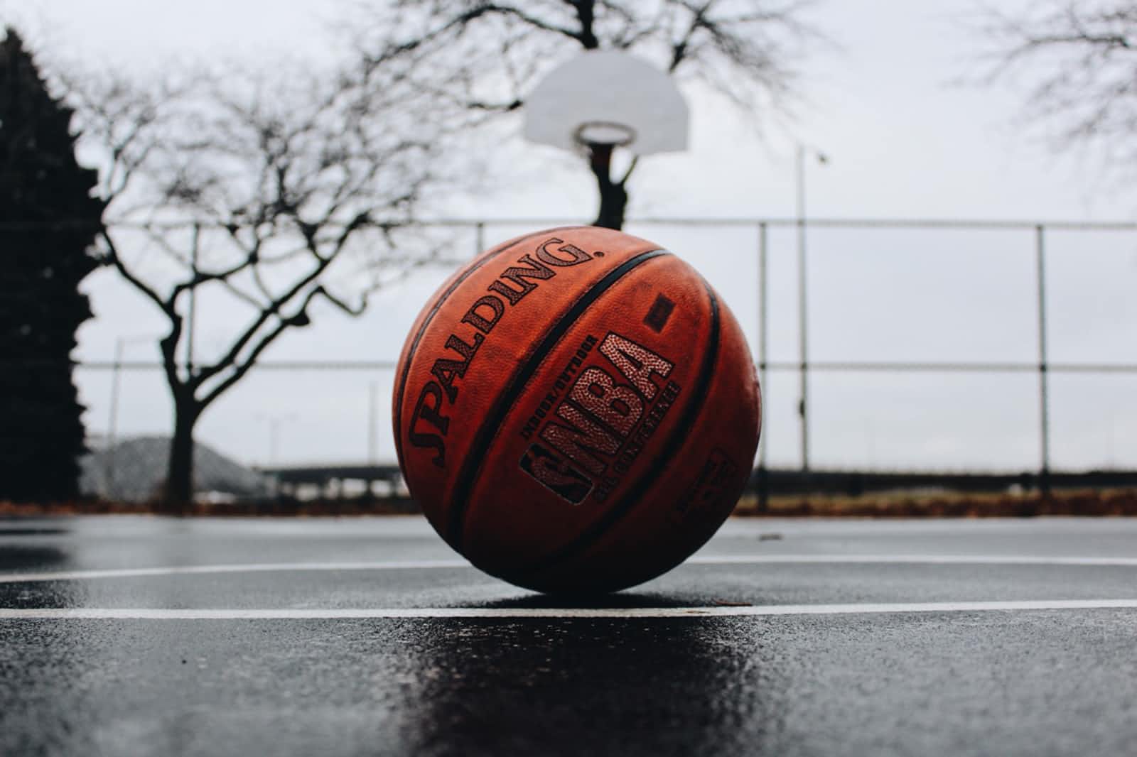 Basketball on a concrete basketball court