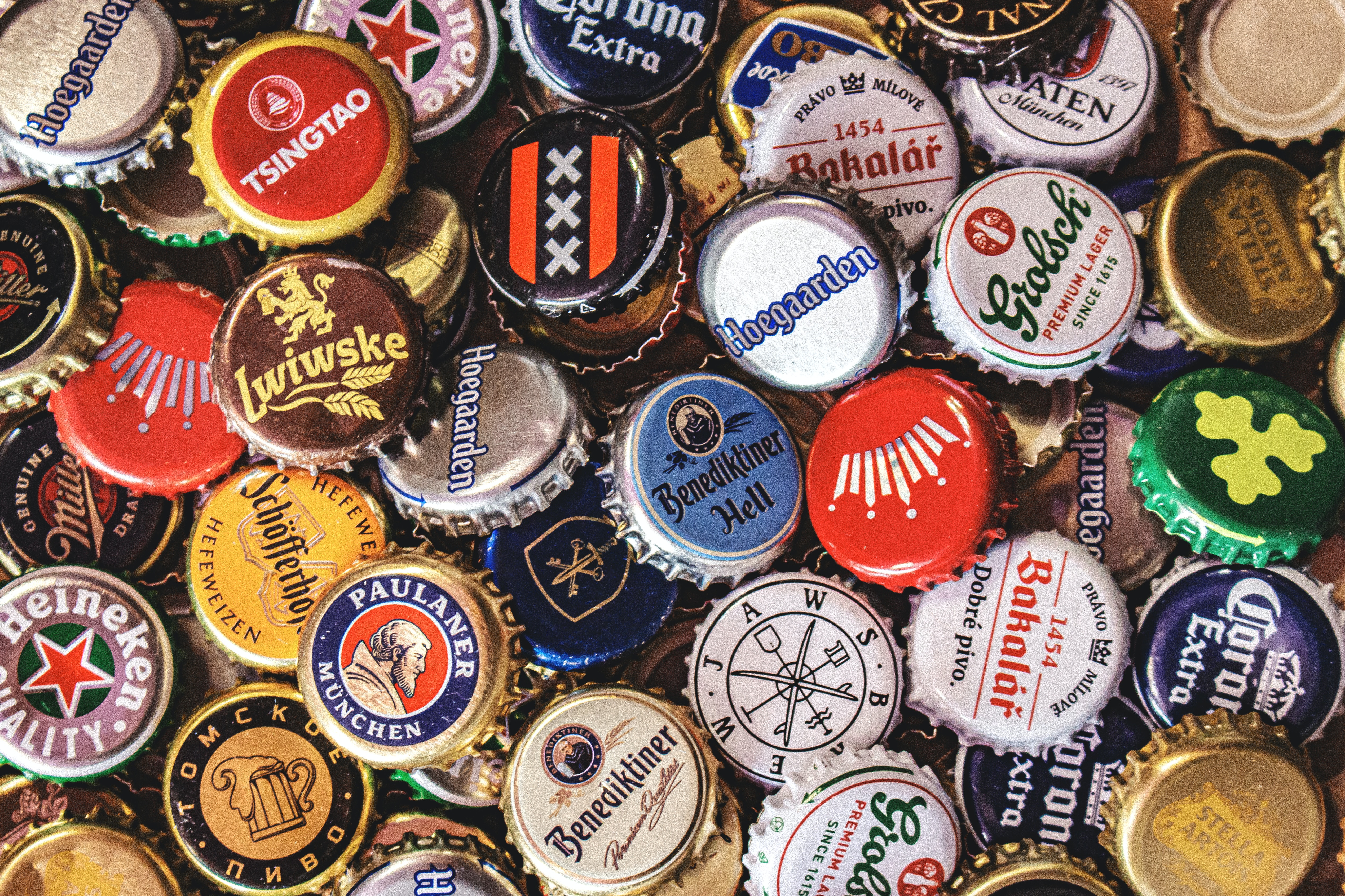 Bottle caps with different beer logos